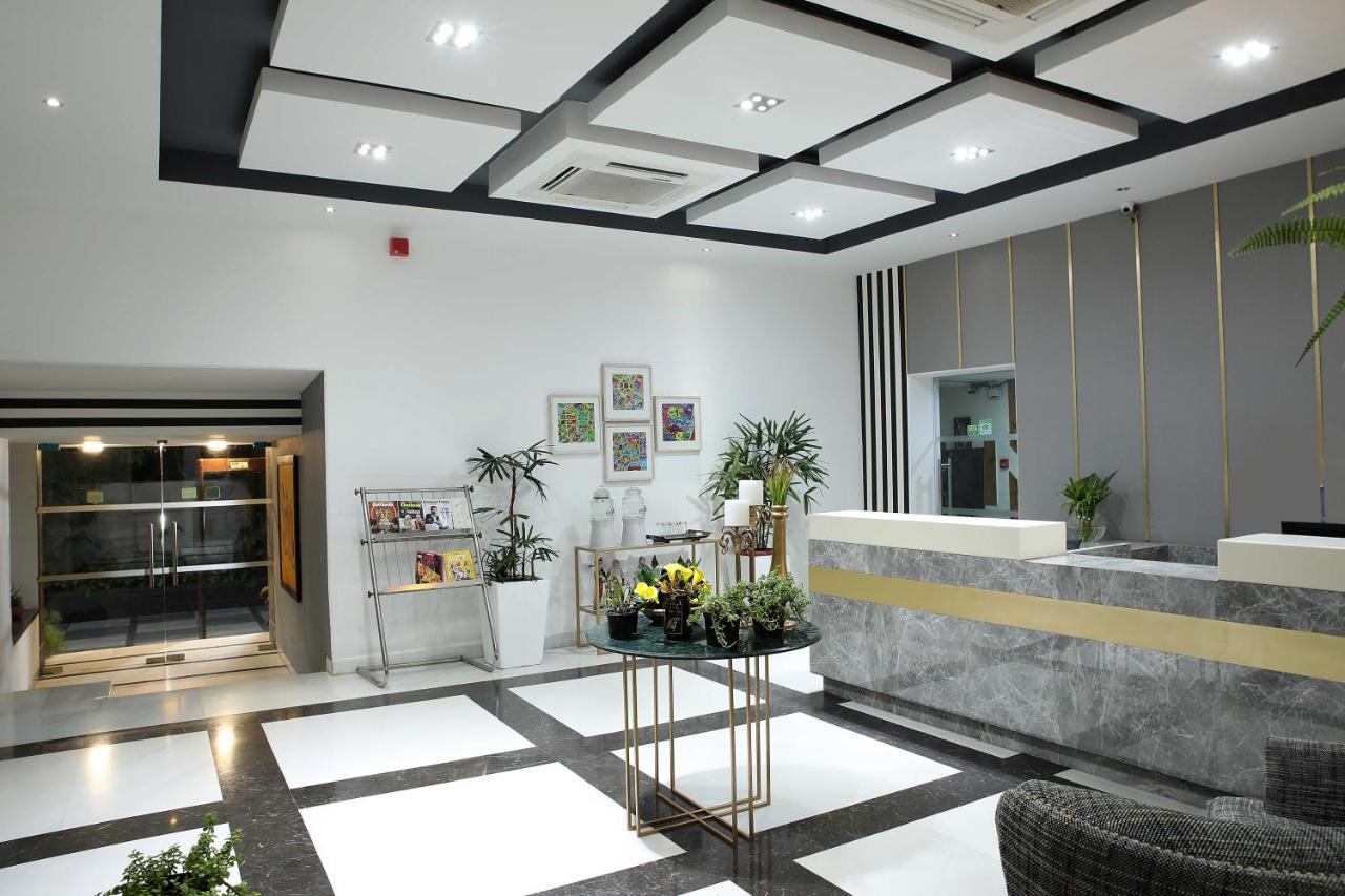 होटल Ahuja Residency Sunder Nagar New Delhi